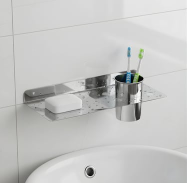 A ss soap dish with brush holder displayed