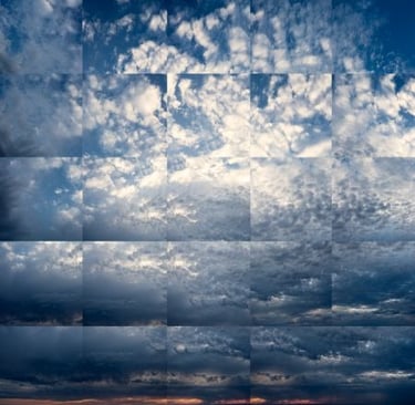 Abstract photographic collage of blue sky with layered cloud textures