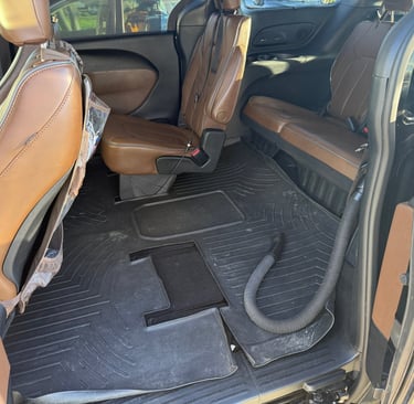vacuuming mini-van rear seat