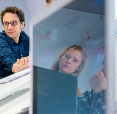 Medical device engineers exchanging ideas to drive innovation in minimally invasive technologies