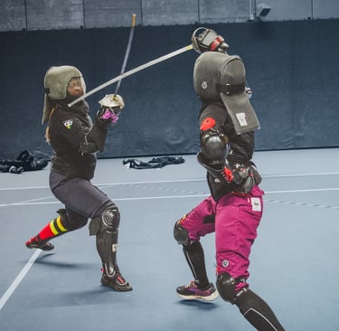 Photo by Andy McCormack/@the.hematog. Aphra competing in women's + Sabre, Albion 2025.