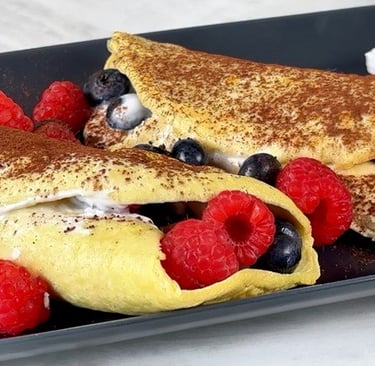 Light coconut crêpes made with coconut flour and almond milk — healthy, dairy-free breakfast.