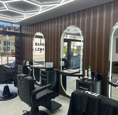 a salon with a large mirror and a mirror