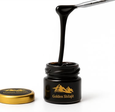 Pure Himalayan Golden Shilajit resin dripping from a spoon into a black glass jar.