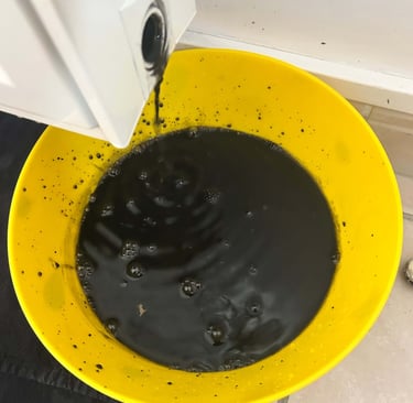 Eau noire dans un radiateur lors d'une purge pour désembouage