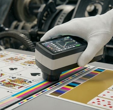 Using spectrodensitometer for color quality control in card printing.