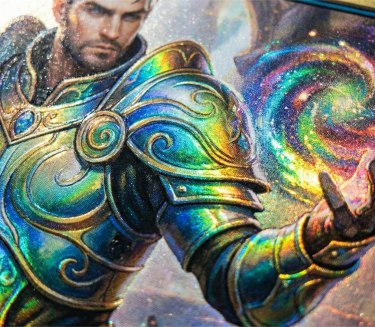 Close up of Cold Foil printing on a trading card showing metallic gradients.