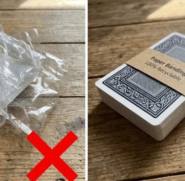 Plastic-free playing card packaging with paper belly band vs shrink wrap.