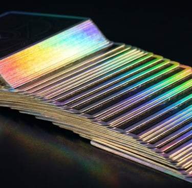 Holographic gilded edge playing cards showing rainbow reflection