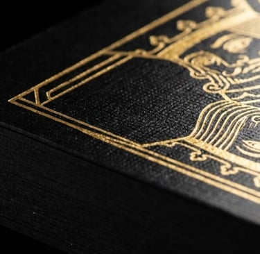 Custom tarot deck with matte black edges and gold foil details.