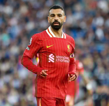 a man in a red shirt and a soccer ball