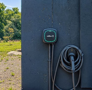 Complimentary level 2 EV charger for guests with electric vehicles.