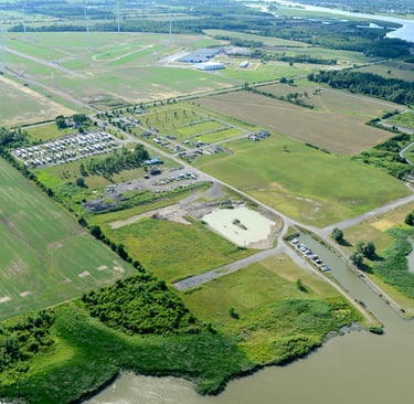 maitland shoresl RV park and marina near green farmland and wind turbines.