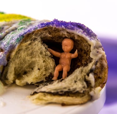 King cake with plastic baby inside