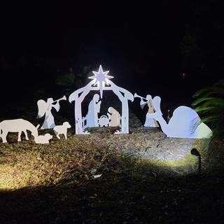 spotlights on outdoor Nativity scene