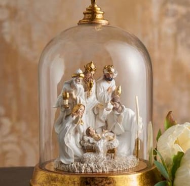 Nativity displayed under cloche
