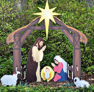 an outdoor nativity scene with a nativity scene