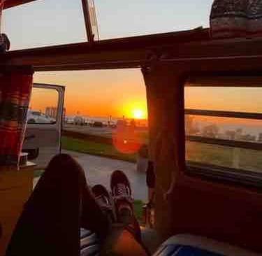 Campervan parked at a remote beach