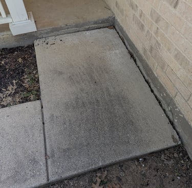 Before picture of a landing/side walk in Krum Texas