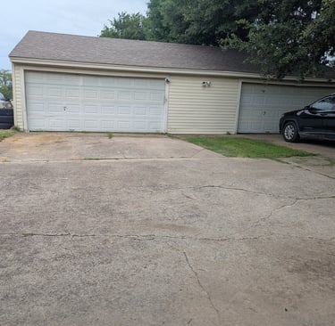 Before picture of a residential driveway that needs cleaned. 
