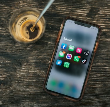 iPhone and Cold Drink on Desk