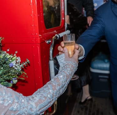 bride handed a glass of champagne 