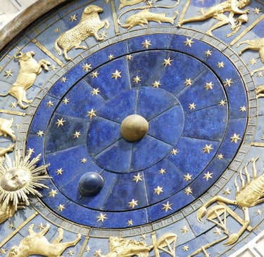 simbolički prikaz sata s astrološkim simbolima