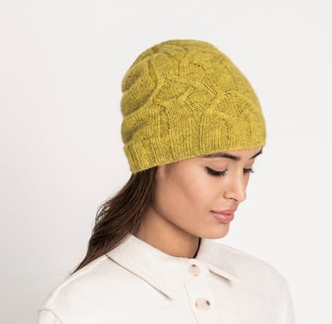 Woman in knit hat of Woolstok Light yarn