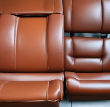 A detailed view of a textured surface featuring brown and white patterns, with a prominent leather tag embossed with the text 'Furniture'. The tag is placed on a soft fabric, contributing to a cozy aesthetic.