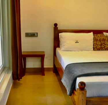 NELLIYAMPATHY STAY AT WOODSVLLE BEDROOM