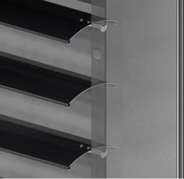 a close up of a metal rack with several shelves