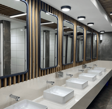 row of sinks and mirrors