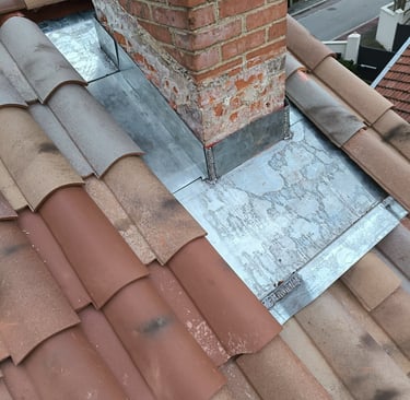 rénovation abergement cheminée sur une  toiture