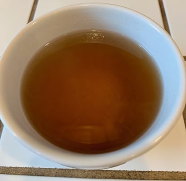 An amber brown infusion of roasted Cleavers seeds