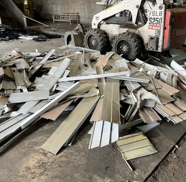 Aluminum siding being recycled