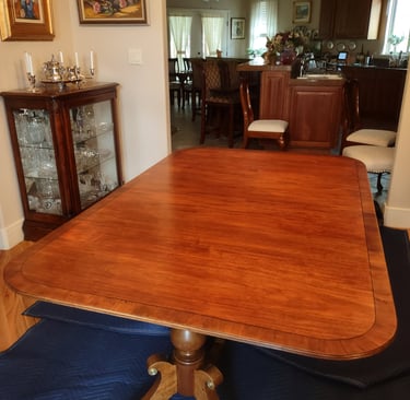 Restored vintage maple dining table. Was in the back yard for 10 years.