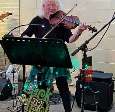 Laurie of Crossmolina Band playing violin.