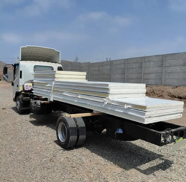 a truck with a flatbed trailer with a flat bed