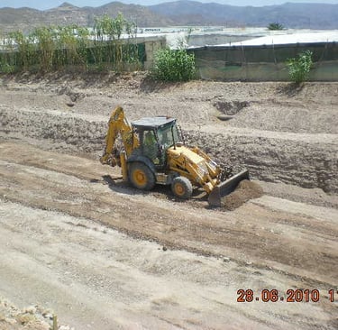 retroexcavadora mixta JCB martillo 