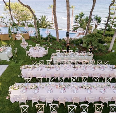 Aerial view of luxury destination wedding setup by the sea at Villa El Rincon Marbella