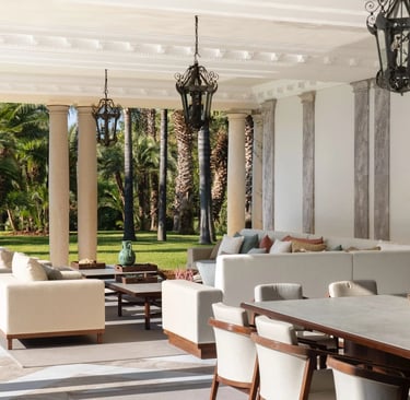 Covered terrace dining area overlooking gardens