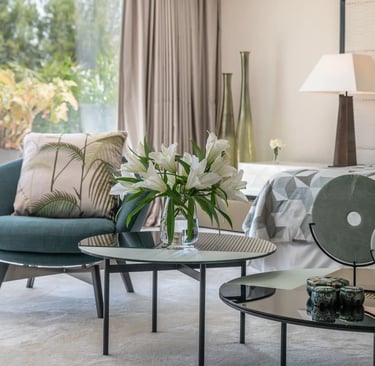 Elegant sitting area with floor to ceiling windows