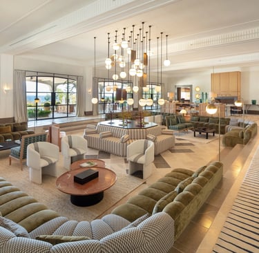 Salon at Villa La Gratitud with chandeliers and custom furnishings