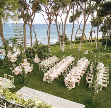 Aerial view of beachfront gala dinner setup in Marbella