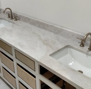 White granite double-sink bathroom countertop sealed in Upstate SC