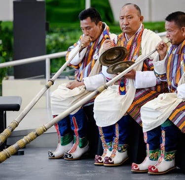 bhutanese-men-using-their-local-version-trumpet-at-the-masked-dance-festival-in-the-capital-thimphu