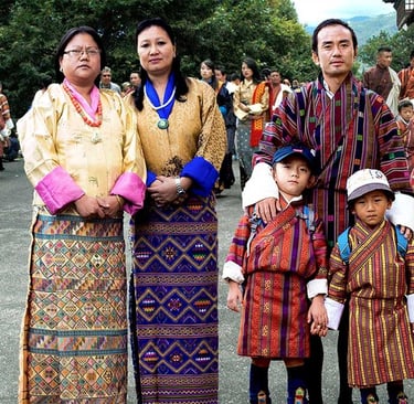 Bhutanese-Family-Draped-In-Their-National-Costumes-During-Masked-Dance-Festival
