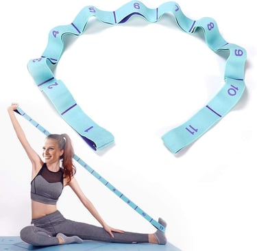 a woman is sitting on a mat with a tape measure tape measure tape