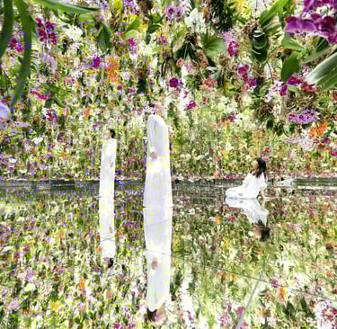 a woman sitting in the mirror room with flowers