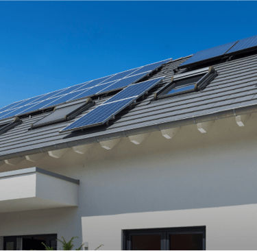 a solar paneled roof with solar panels on a house